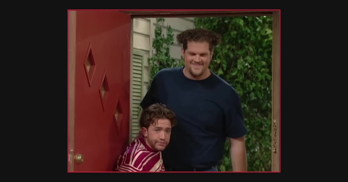 Abe Benrubi as Cousin Jimmy with Bud Bundy at the Bundy front door in Married with Children "Wedding Repercussions"